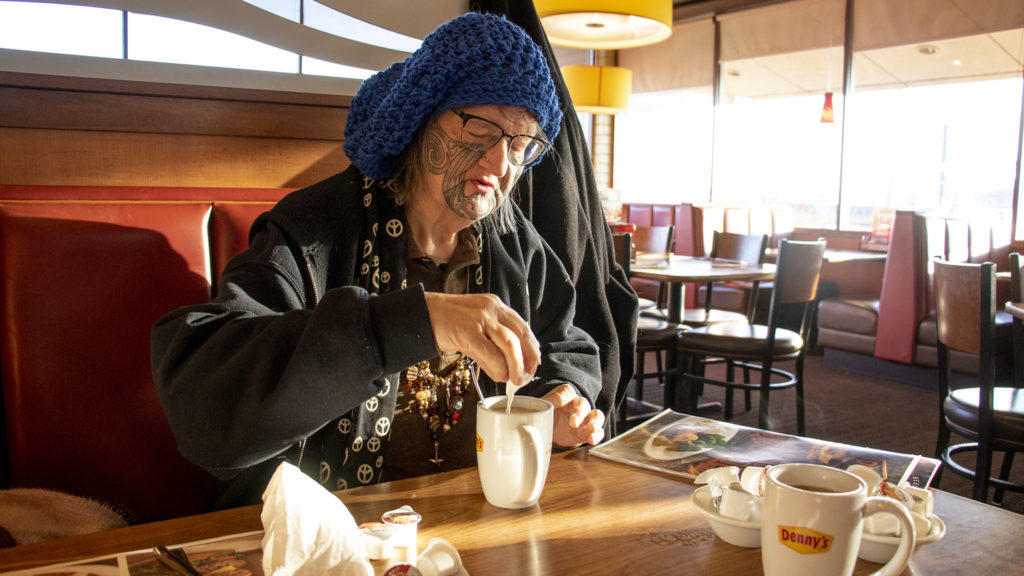 Ruth eats breakfast at her favorite place: Denny's at 17th and Federal in the West Colfax neighborhood, March 9, 2019. (Kevin J. Beaty/Denverite)
