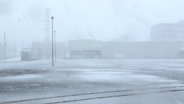 Lots of snow at Monaco and Evans in southeast Denver, March 13, 2019. (Kevin J. Beaty/Denverite)