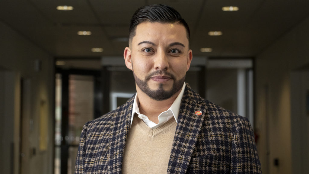 City Council District 3 candidate Raymond Montoya poses for a portrait inside Denver Elections headquarters, March 14, 2019. (Kevin J. Beaty/Denverite)