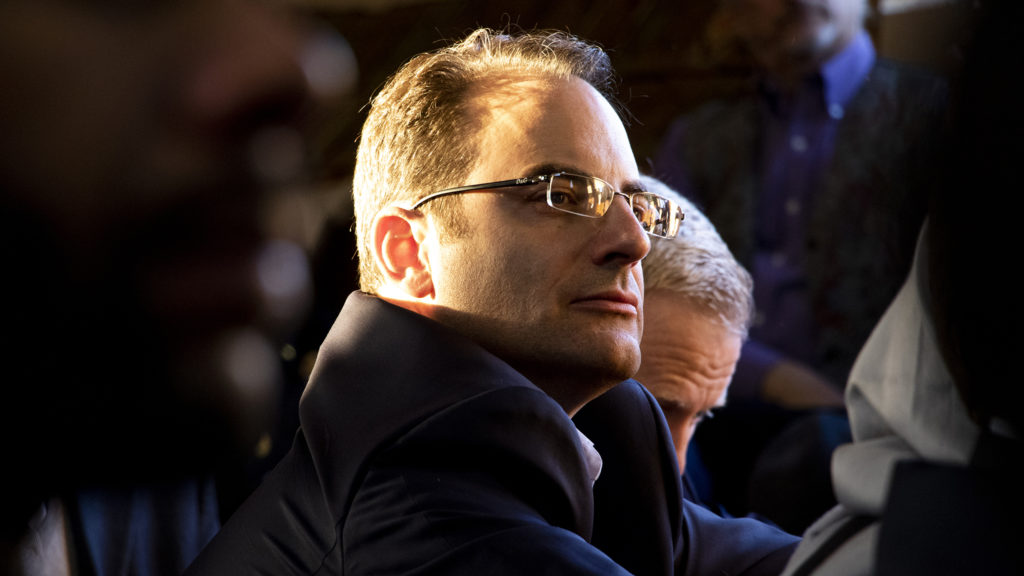 Colorado Attorney General Phil Weiser listens during a vigil for the victims of a massacre at a Christchurch, New Zealand, mosque at the Colorado Muslim Society, March 16, 2019. (Kevin J. Beaty/Denverite)