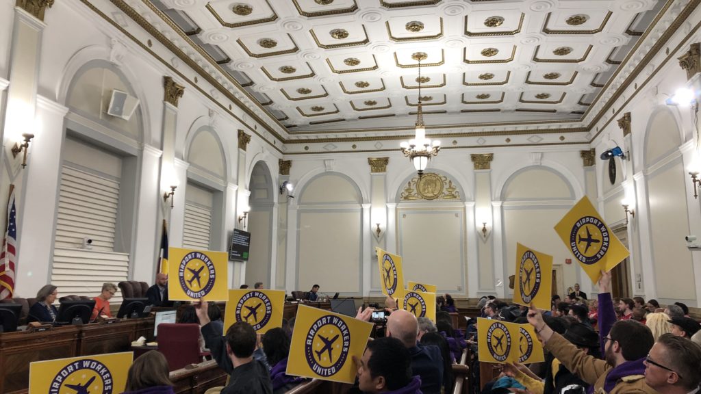 Unionized workers show their support for the $15 minimum wage for city employees. (David Sachs/Denverite)