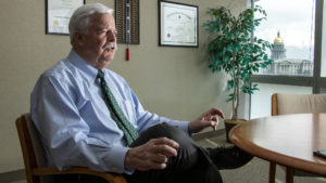 Denver City Auditor Timothy M. O'Brien speaks to a reporter in his office, April 3, 2019. (Kevin J. Beaty/Denverite)