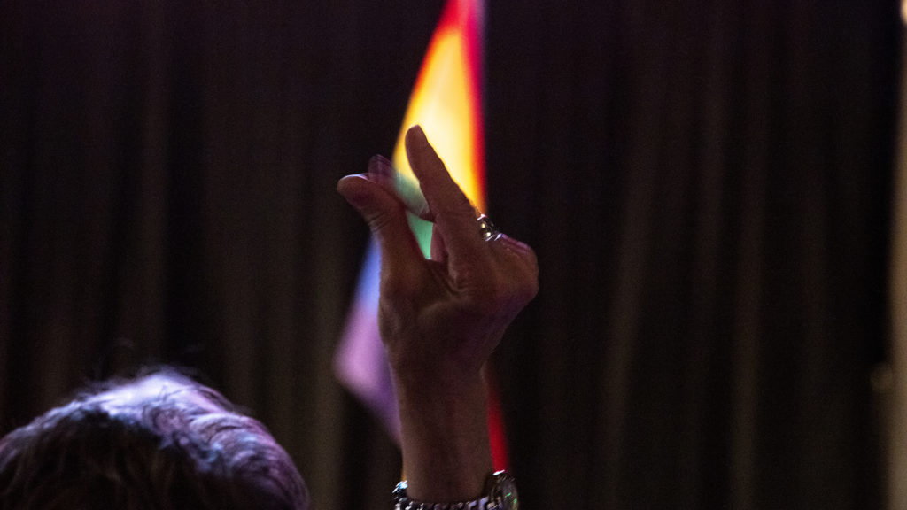Elfriede Leicht snaps during a mayoral candidate forum on LGBTQ issues at the Exdo event center, RiNo, Five Points, April 4, 2019. (Kevin J. Beaty/Denverite)