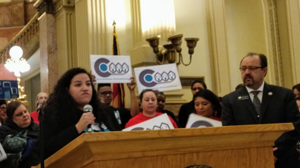 Celesté Martinez, UNE organizing director, speaks at the Capitol during a news conference by supporters of a bill to allow rent control in Colorado. April 9, 2019. (Donna Bryson/Denverite)
