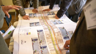 Denver Public Works holds open "office hours" about the Broadway bikeway's future. Metropolis Coffee, May 22, 2019. (Kevin J. Beaty/Denverite)