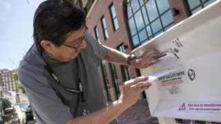 Kenny Borrego casts his ballot outside of the Blair-Caldwell African American Research Library on Welton Street. Five Points, June 4, 2019. (Kevin J. Beaty/Denverite)