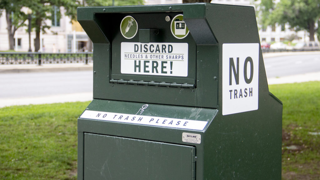 A needle disposal box near Civic Center Park, June 17, 2019. (Esteban L. Hernandez/Denverite)
