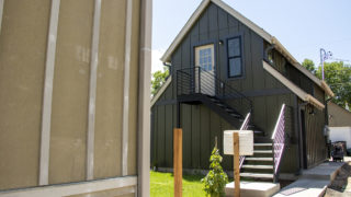A modular ADU and garage installed behind Simple Homes co-founder and COO David Schultz, July 9, 2019. (Kevin J. Beaty/Denverite)