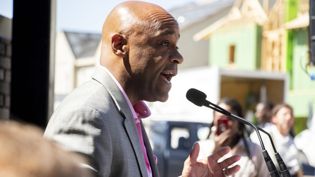 Mayor Michael Hancock speaks during a ribbon-cutting ceremony for the Moline Apartments in Stapleton, July 19, 2019. (Kevin J. Beaty/Denverite)