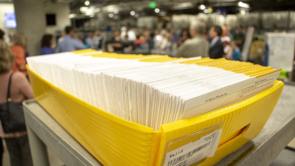 Jefferson County's elections division processes ballots for a special election, July 1, 2019. (Kevin J. Beaty/Denverite)