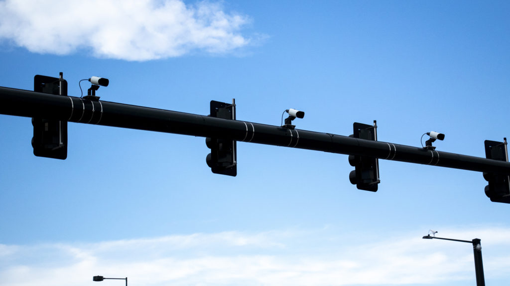 License plate-reading cameras at the intersection of 6th Avenue and Federal Boulevard, July 23, 2019. (Kevin J. Beaty/Denverite)