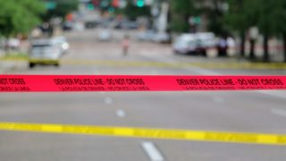 Denver police investigate an officer-involved shooting at 11th Avenue and Lincoln Street. July 1, 2019. (Kevin J. Beaty/Denverite)