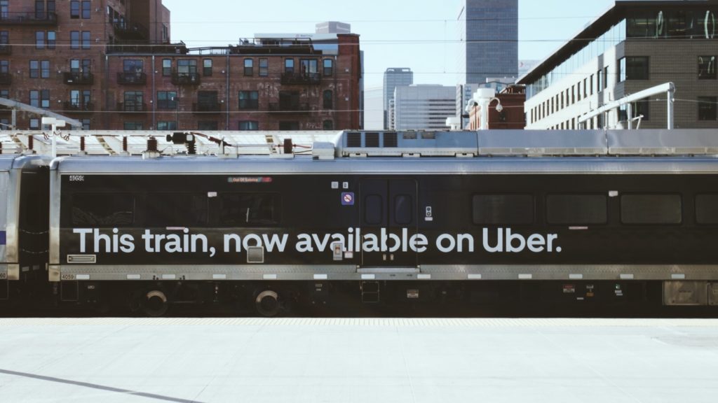 An RTD train with an Uber logo. Photo Courtesy of Uber.
