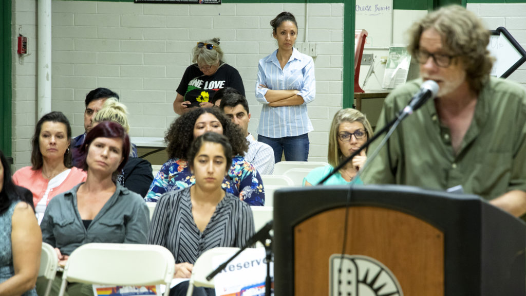 District 9 City Councilwoman Candi CdeBaca listens to testimony during a hearing to determine whether I-70 construction can continue to be louder than normal legal levels, held at the Swansea Rec Center, Aug. 9, 2019. (Kevin J. Beaty/Denverite)