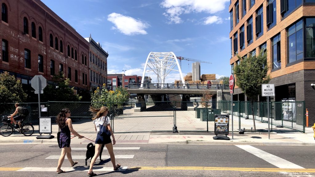 Most of Platte Street Plaza is closed off for construction. A walking and biking path remain open. (David Sachs/Denverite)