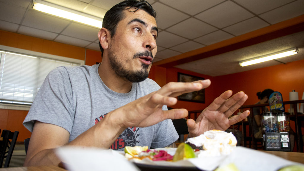 Chef Jose Avila eats tacos atLa Calle Taqueria y Carnitas on Alameda, one of his favorite spots. Sept. 10, 2019. (Kevin J. Beaty/Denverite)