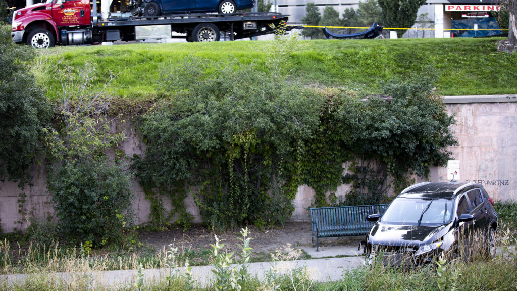 A car that landed on the Cherry Creek Trail, Sept. 25, 2019. (Kevin J. Beaty/Denverite)