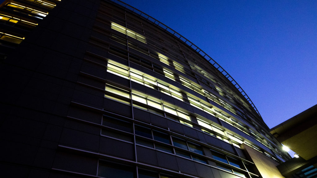 The old Denver Post building downtown is illuminated at dawn, Sept. 18, 2019. (Kevin J. Beaty/Denverite)
