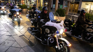 Denver Police officers cruise the 16th Street Mall on motorcycles at dawn. Sept. 18, 2019. (Kevin J. Beaty/Denverite)