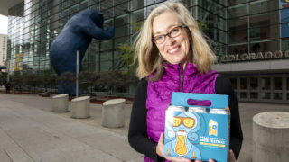 Ann Obenchain, the marketing director for the Brewers Association, poses for a portrait outside of the Great American Beer Festival grounds at the Colorado Convention Center, Oct. 2, 2019. (Kevin J. Beaty/Denverite)