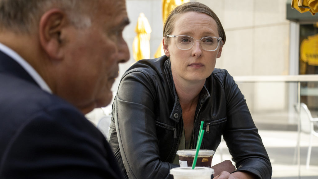 Former Pennsylvania Gov. Ed Rendell and Harm Reduction Action Center Executive Director Lisa Ravelle speak to a reporter at a downtown Starbucks, a place where people use intravenous drugs. Oct. 3 2019. (Kevin J. Beaty/Denverite)