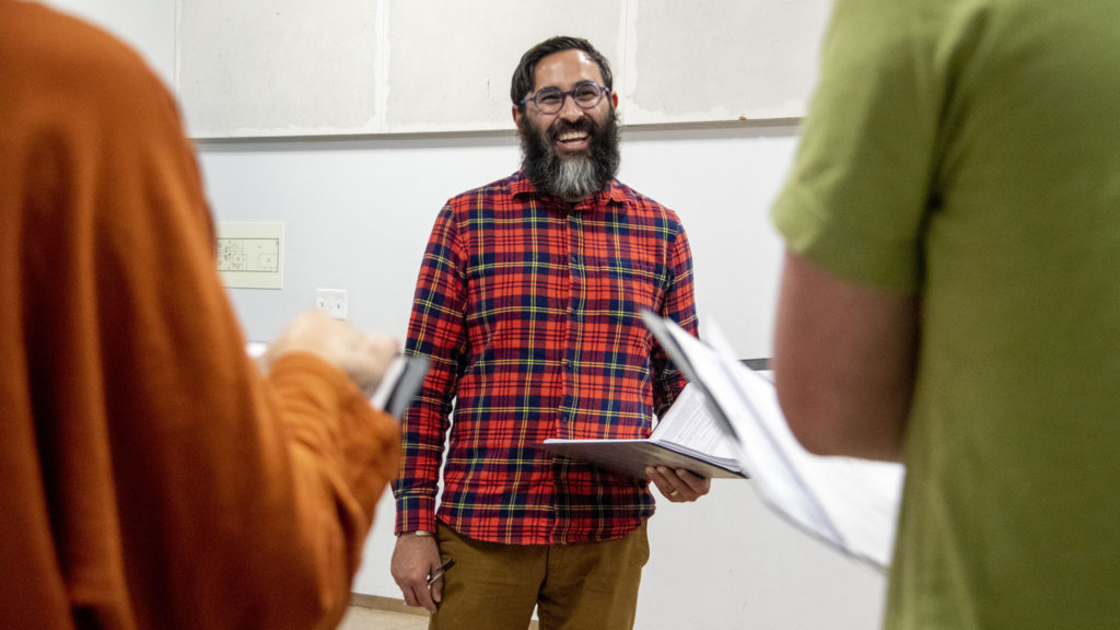 "My Country, My Country" director Manuel Aragon workshops the play with the cast at the Robert and Judi Newman Center for Theater Education at the Denver Center for the Performing Arts, Oct. 16, 2019. (Kevin J. Beaty/Denverite)