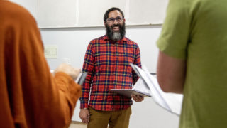 "My Country, My Country" director Manuel Aragon workshops the play with the cast at the Robert and Judi Newman Center for Theater Education at the Denver Center for the Performing Arts, Oct. 16, 2019. (Kevin J. Beaty/Denverite)