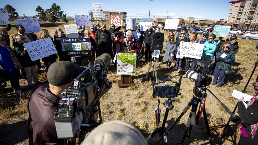 Woody Garnsey leads a rally on the edge of Park Hill Golf Course demanding the space not be redeveloped. Oct. 22, 2019. (Kevin J. Beaty/Denverite)