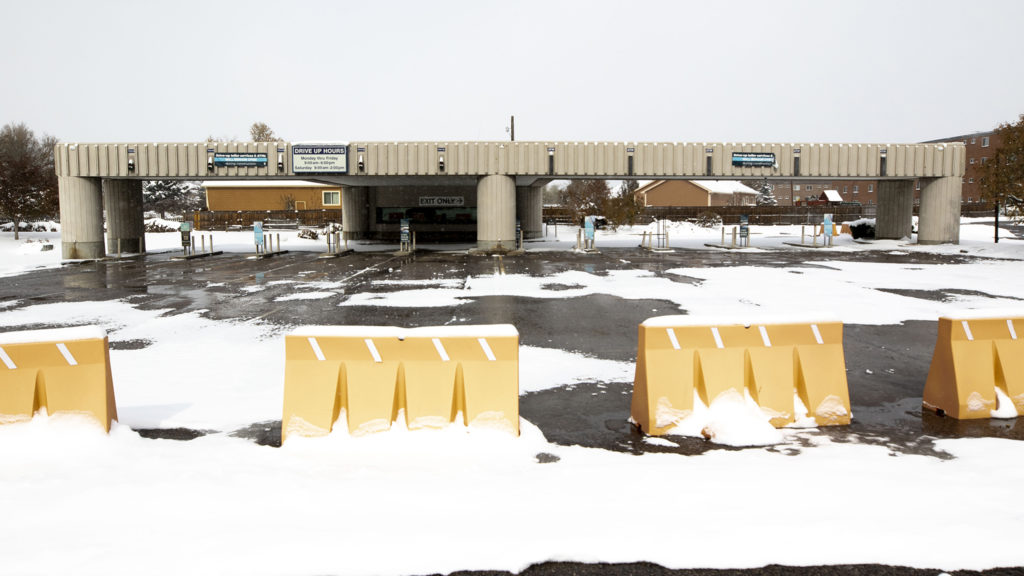 An old drive-up ATM spot in Aurora that's poised to be redeveloped. Oct. 29, 2019. (Kevin J. Beaty/Denverite)