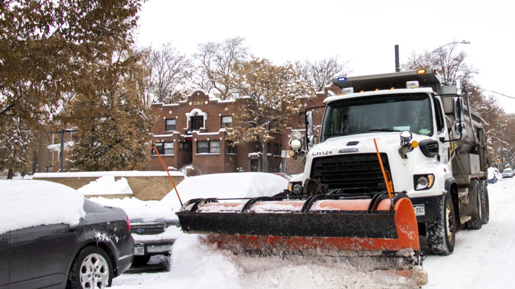A Denver Public Works snowplow on the job in Capitol Hill, Oct. 29, 2019. (Kevin J. Beaty/Denverite)
