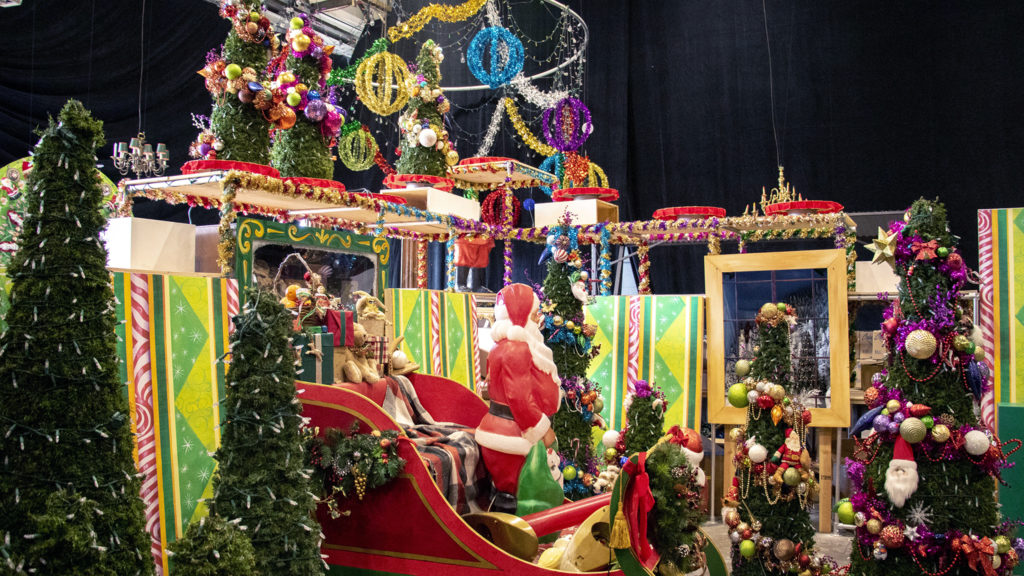 This is "Santa Land. " Lonnie Hanzon's "Camp Christmas" is under construction at Stanley Marketplace. Nov. 15, 2019. (Kevin J. Beaty/Denverite)