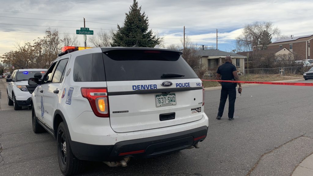Police have shut down streets in a two block radius around the home in the 900 block of South Perry where a man has barricaded himself inside. Nov. 19, 2019. (Esteban L. Hernandez/Denverite)