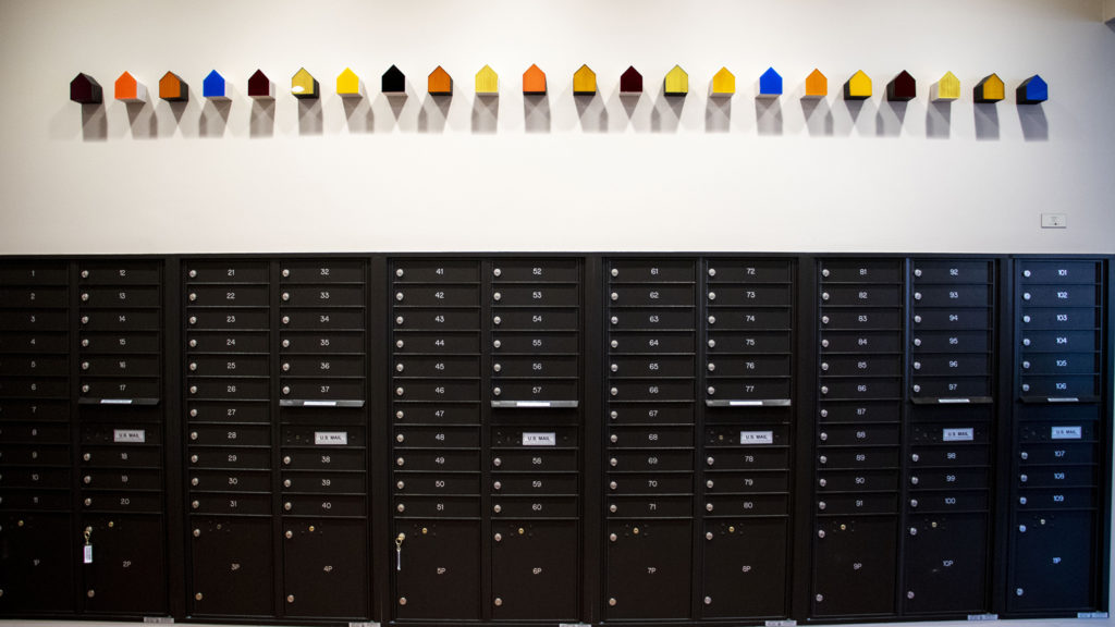 "Houses" by Craig Robb inside the Quayle apartments on Broadway, Nov. 21, 2019. (Kevin J. Beaty/Denverite)