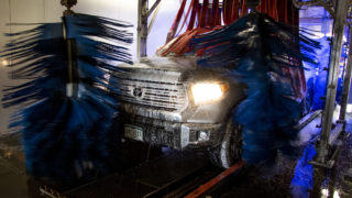 A truck is cleansed inside Bear's Car Wash Express in Commerce City, Dec. 12, 2019. (Kevin J. Beaty/Denverite)