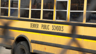 A Denver Public Schools buse at its home off Federal Boulevard, Dec. 14, 2019. (Kevin J. Beaty/Denverite)