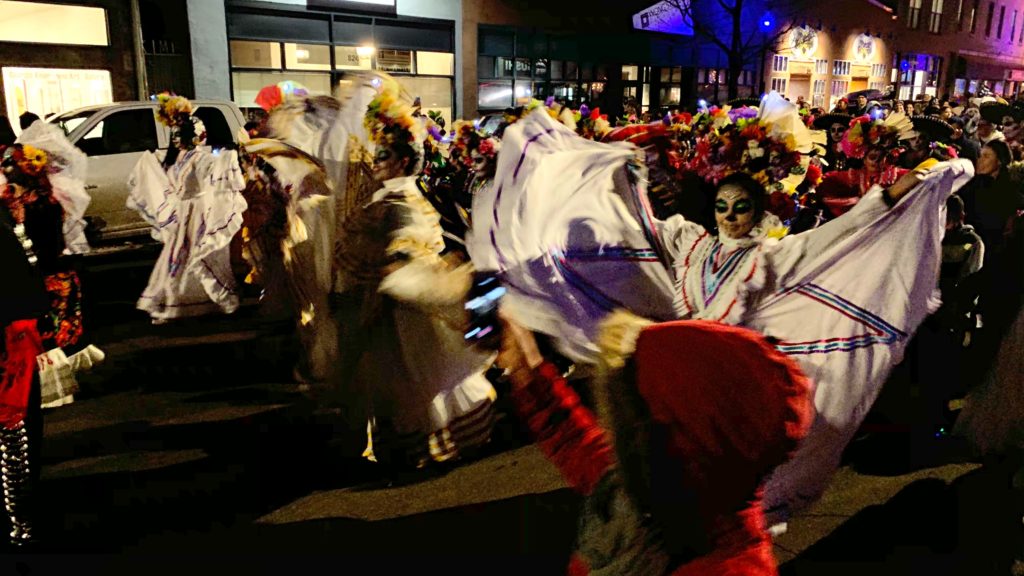 The Dia de Muertos parade along Santa Fe Drive on Friday, Nov. 1, in Denver. (Esteban L. Hernandez/Denverite)