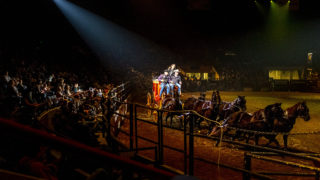 A stage coach makes the rounds during the "Colorado vs the World" rodeo qualifying event at the National Western Stock Show, Jan. 11, 2020. (Kevin J. Beaty/Denverite)