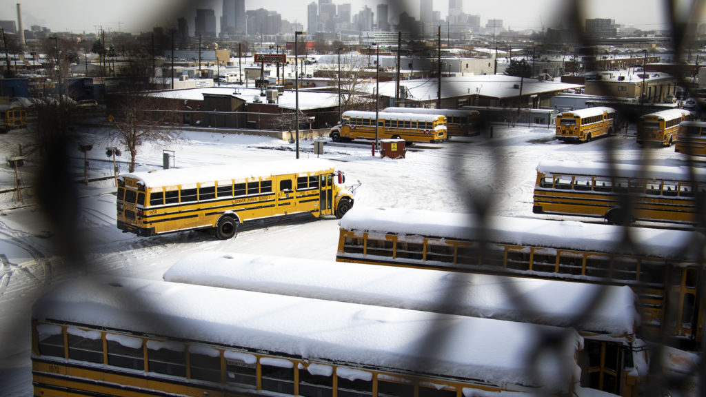Denver Public Schools buses on a snowy day, Feb. 4, 2020. (Kevin J. Beaty/Denverite)