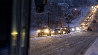 A snowy night and slippery conditions on Sheridan Boulevard, Feb. 7, 2020. (Kevin J. Beaty/Denverite)