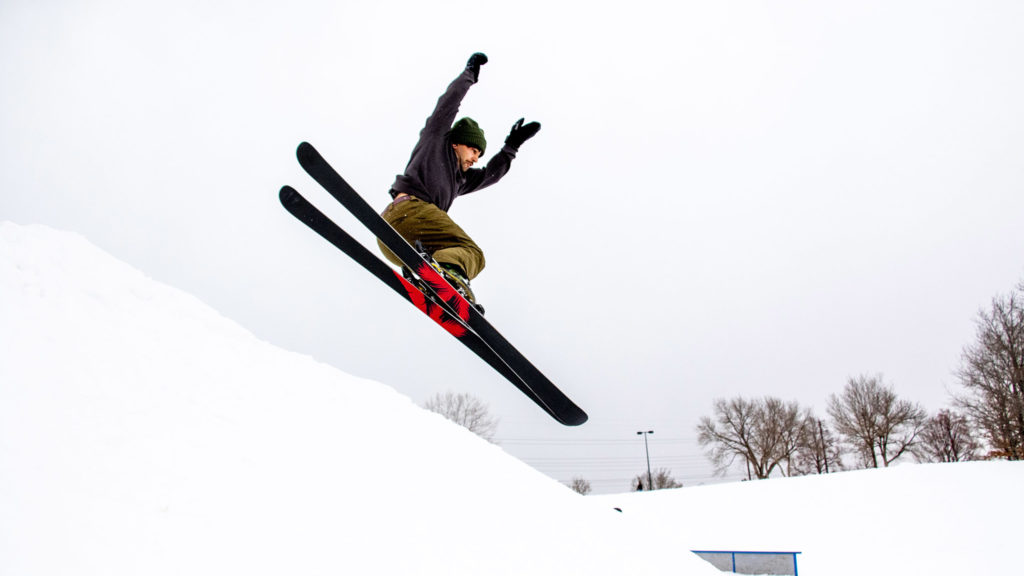 Gabe Alhussaini flies off a jump at the Ruby Hill Rail Yard, Feb. 12, 2020. (Kevin J. Beaty/Denverite)