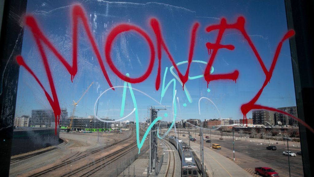 RTD commuter rail trains in downtown Denver. (Hart Van Denburg/CPR News)