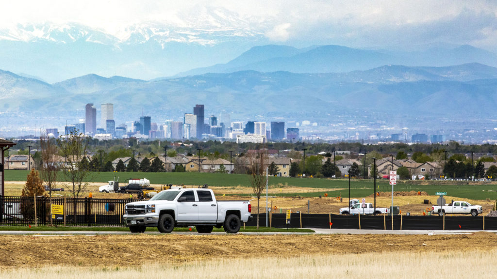 Downtown Denver seen from the future site of the Painted Prairie, a developing neighborhood by DIA in Aurora. May 14, 2020. (Kevin J. Beaty/Denverite)