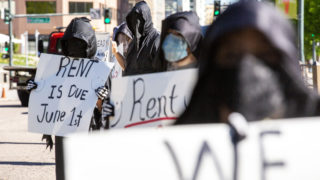 Denver Democratic Socialists, dressed as grim reapers, protest a lack of eviction protections in front of the Capitol. May 26, 2020. (Kevin J. Beaty/Denverite)