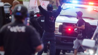 Protesters and police clash in downtown Denver during a demonstration against the death of George Floyd on Thursday, May 28, 2020. (Hart Van Denburg/CPR News)