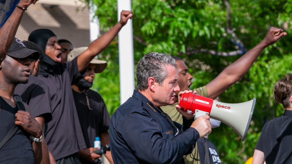 Denver Police Chief Paul Pazen marches and speaks with demonstrators on Monday, June 1, 2020, as they peacefully protest the death of George Floyd at the hands of Minneapolis police. (Hart Van Denburg/CPR News)