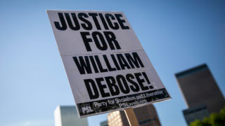 Demonstrators protest the police killing of William DeBose and other victims of police brutality Friday, June 12, 2020, at a peaceful state Capitol rally and march up Colfax int Capitol Hill.