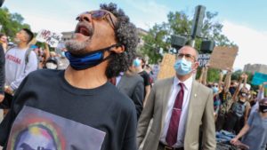 Walter DeBose shouts during a demonstration against racism and police brutality and what he insists was the murder of his son William at the hands of Denver police.