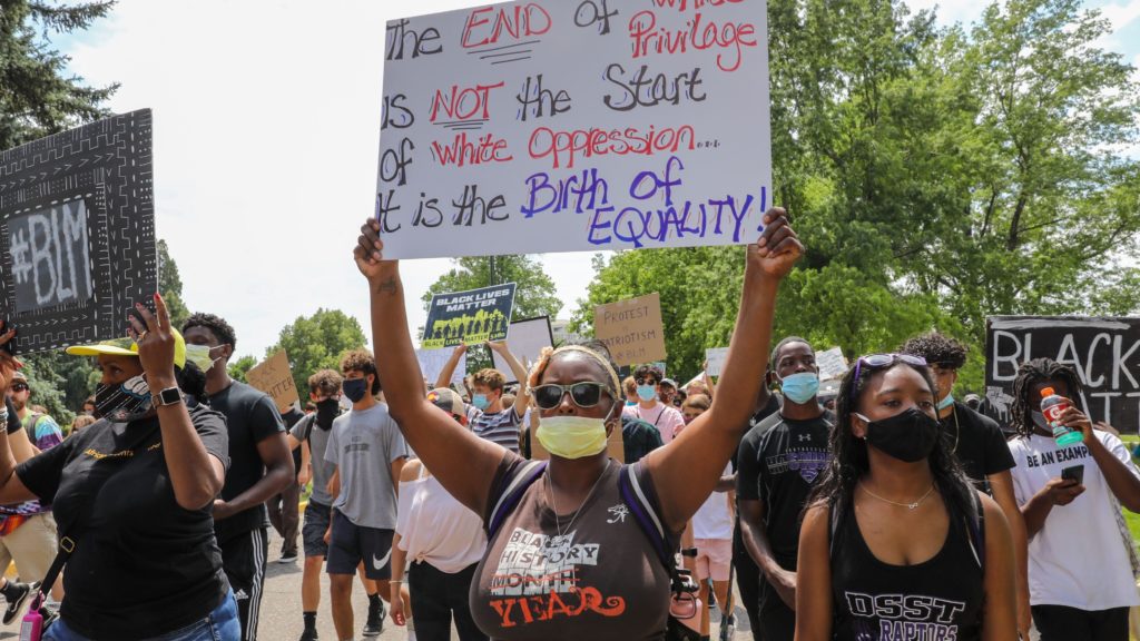 Demonstrators march on Tuesday, June 16, as part of the DSST Black Lives Matter protest. (Hart Van Denburg/CPR)