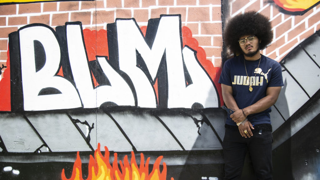 Elijah Beauford, 21, recalls a school system in Aurora that wasn't accepting of Black and brown students. (Brien Hollowell/Special to Denverite)