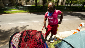 Derrick Haye stands outside of Morey Middle School in Capitol Hill, where he's been living for the last few weeks. July 9, 2020.